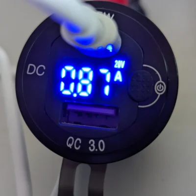 Built-in USB-C QC 3.0 65 W charger socket with blue voltage and current display